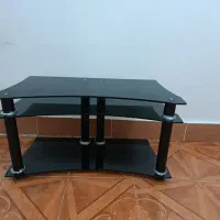 زیر تلویزیونی شیشه ای