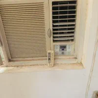 کولر گازی پشت پنجره