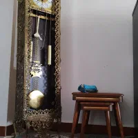 ساعت و سه عدد میز عسلی