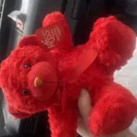 عروسک قرمز خارجی