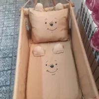گهواره نوزاد با بالشت و تشک