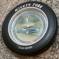 ساعت چراغ خوابی طرح لاستیک