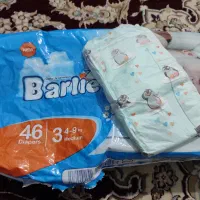 پوشک بچه وکناره فرش