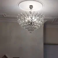 ۱ عددلوستر کریستالی ۱۰ شاخه بدنه استیل