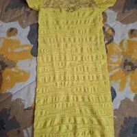 تعدادی لباس در حد نو