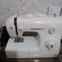 دوعدد فرش شش متری ویک گاز چرخ خیاطی میز تحریر