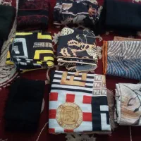 تعدادی روسری و شال فروشی