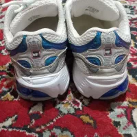 کتانی نو|کیف، کفش، کمربند|قم, چهل درخت|دیوار