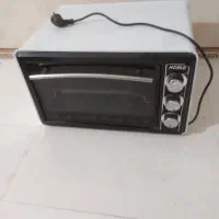 توستر در حد نو با جوجه گردان