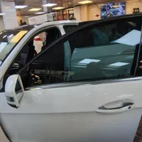 خدمات شیشه دودی ضدخش UV با 3سال گارانتی سیار درمحل