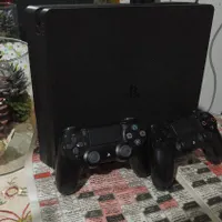 ps4اسلیم کپیخور یک ترابایت دو دسته به همراه بازی