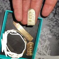 طلای اب شده به وزن ۱۱/۵۶۰ گرم