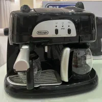 قهوه ساز دلونگی نو با جعبه