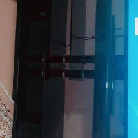 میز تلویزیون شیشه‌ای