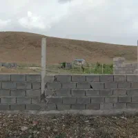 1. زمین باغی دیوارکشی و فنس‌کشی شده کنار جاده اصلی|فروش زمین و ملک کلنگی|دورود, |دیوار