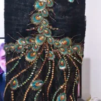 فروش لباس مجلسی کارکرده طرح طاووس در حدنو