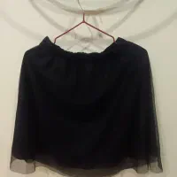 کت صورتی و دامن کوتاه مشکی