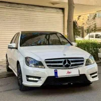 مرسدس بنز + C200 AMG مدل ۲۰۱۴ سفید کم‌کارکرد