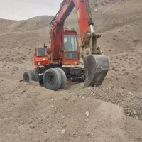 بیل مکانیکی.معاوضعه با ماشین خاور یا سواری