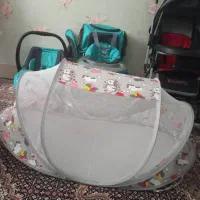 ست کالسکه و کریر وپشه بند کیف و روروک سالم و تمیز