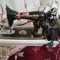 چرخ خیاطی مرد پرنده