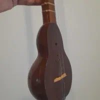 سه تار زیرعبایی|سازهای سنتی|تهران, فلسطین (میدان انقلاب)|دیوار