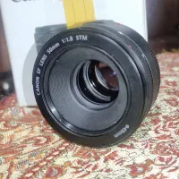 فروش فوری لنز50mm با f1.8 مشابه اکبند.