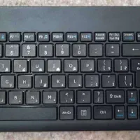 کیبورد بدون سیم تراست با تاچ پد