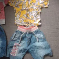 تعدادی لباس پسرانه و دوتا کاپشن دخترانه درحد