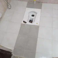 کاشی کاری و سرامیک کاری کار با چسب و سیمان