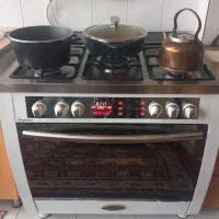 اجاق گاز تاکنو ۵شعله فردار سالم و با صفحه لمسی