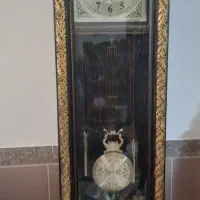 ساعت  ایستاده چوبی در کازرون