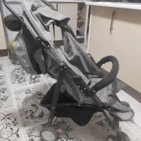 یک عدد ماشین بازی کودک ویک عدد کالسکه
