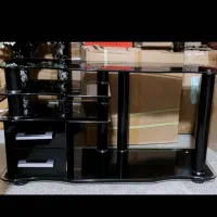 زیر تلویزیون شیشه ای برای تلویزیون ۴۰ اینچ