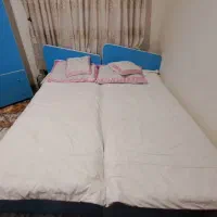 دو عدد تخت تک نفره با کمد
