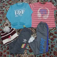 تعداد زیادی لباس پسرونه