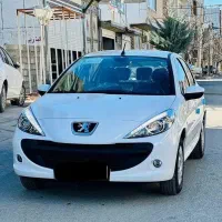 پژو 207موتور tu5رنگ سفید داری کارت طلایی