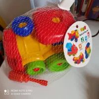 تعدادی اسباب بازی نو و قاب عکس