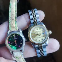 دو تا ساعت زنانه یکیش رولکس سوییس و دیگری..