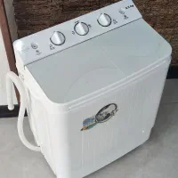 لباسشویی مینی واش . اجاق گاز .لباس شویی.