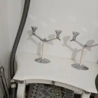 میز کنسول و عدد شمعدانی استیل شیک