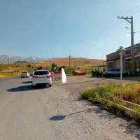 زمین تجاری کنار جاده نهاوند،نورآباد