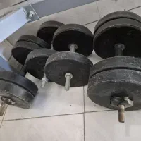 دمبل و میز هالتر و حرکات بدنسازی