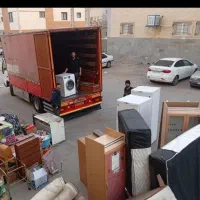 بزرگترین شرکت اسباب‌کشی باچندین کارگرماشین اثاثیه