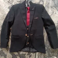 کت و شلوار پسرانه در حد خیلی نو مشکی زاغ