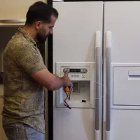 تعمیرتخصصی یخچال فریزروسایدبای سایدتضمینی(درمحل)