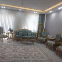 مبلمان استیل همراه با میز و ساعت برنز