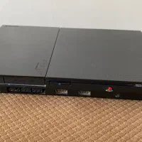 پلی استیشن2 فلش خور و۱۸سی دی بازی و رم