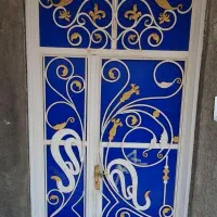 فروش درب آهنی دو لنگه گل دار ، ورودی ساختمان