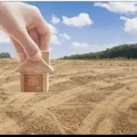 زمین-مزرعه-باآب-ومقداری-درخت